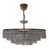 Old chandelier with tassels and brass
