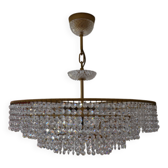 Old chandelier with tassels and brass