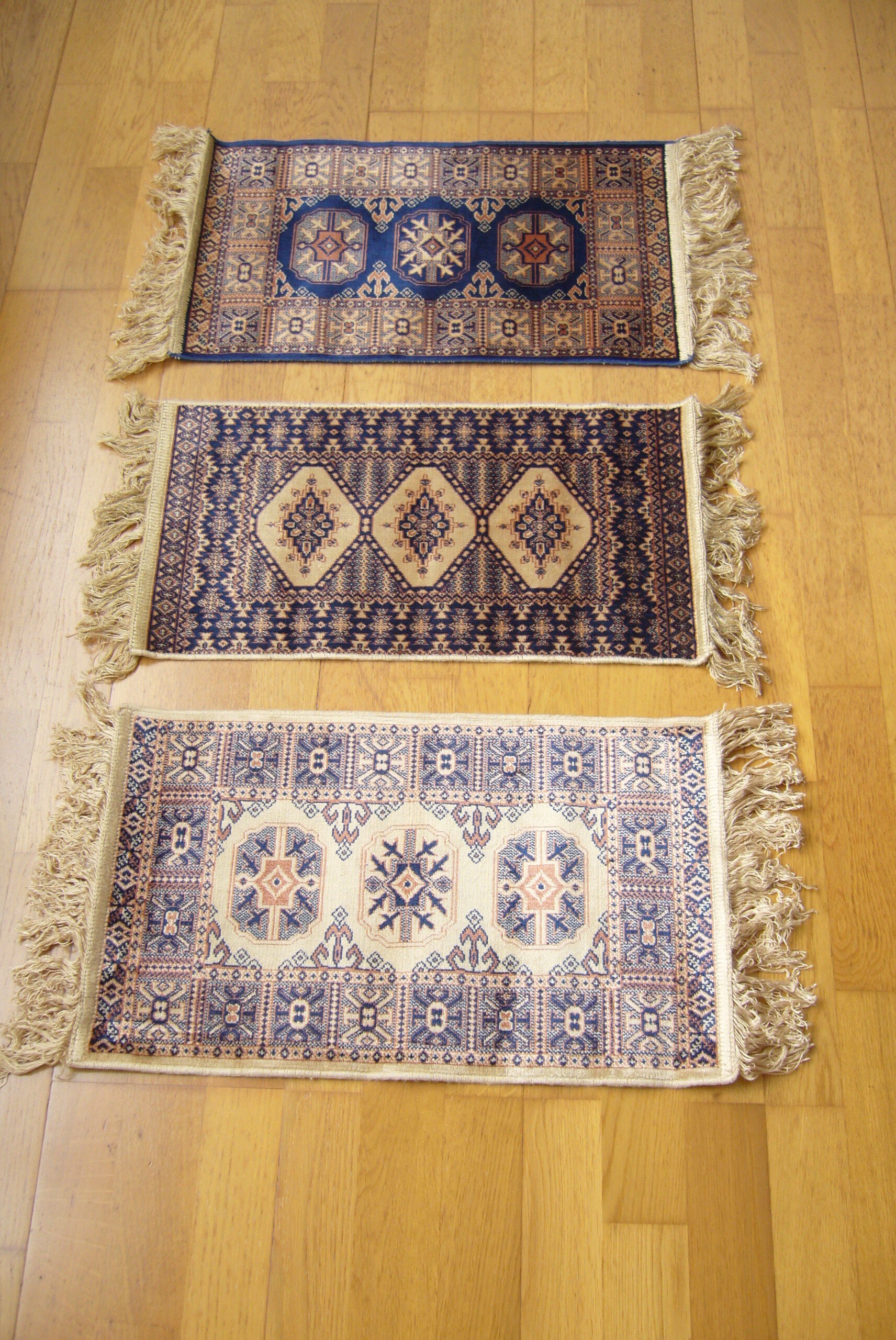 Three oriental rugs 35 x 70 cm