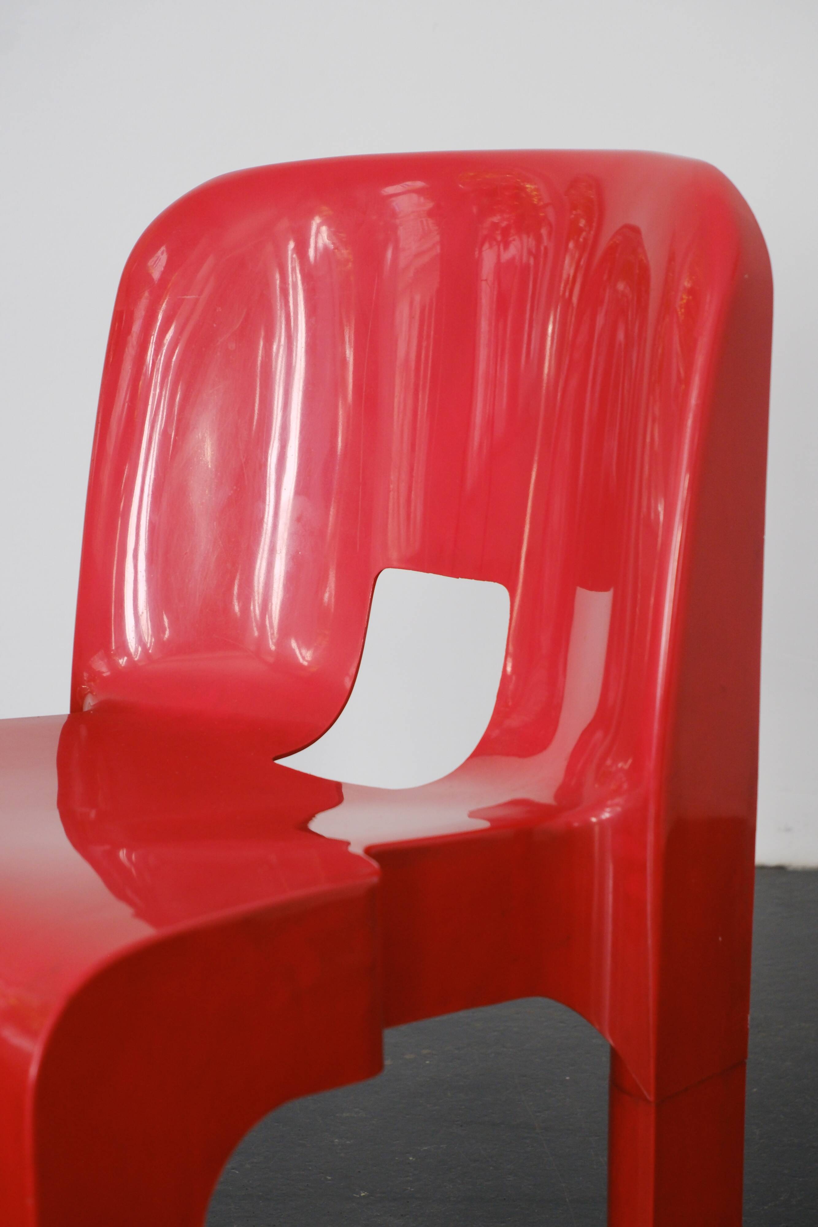 Red "Universale" chair by Joe Colombo / Kartell