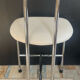 Vintage 70s chair in chrome metal and white faux leather.