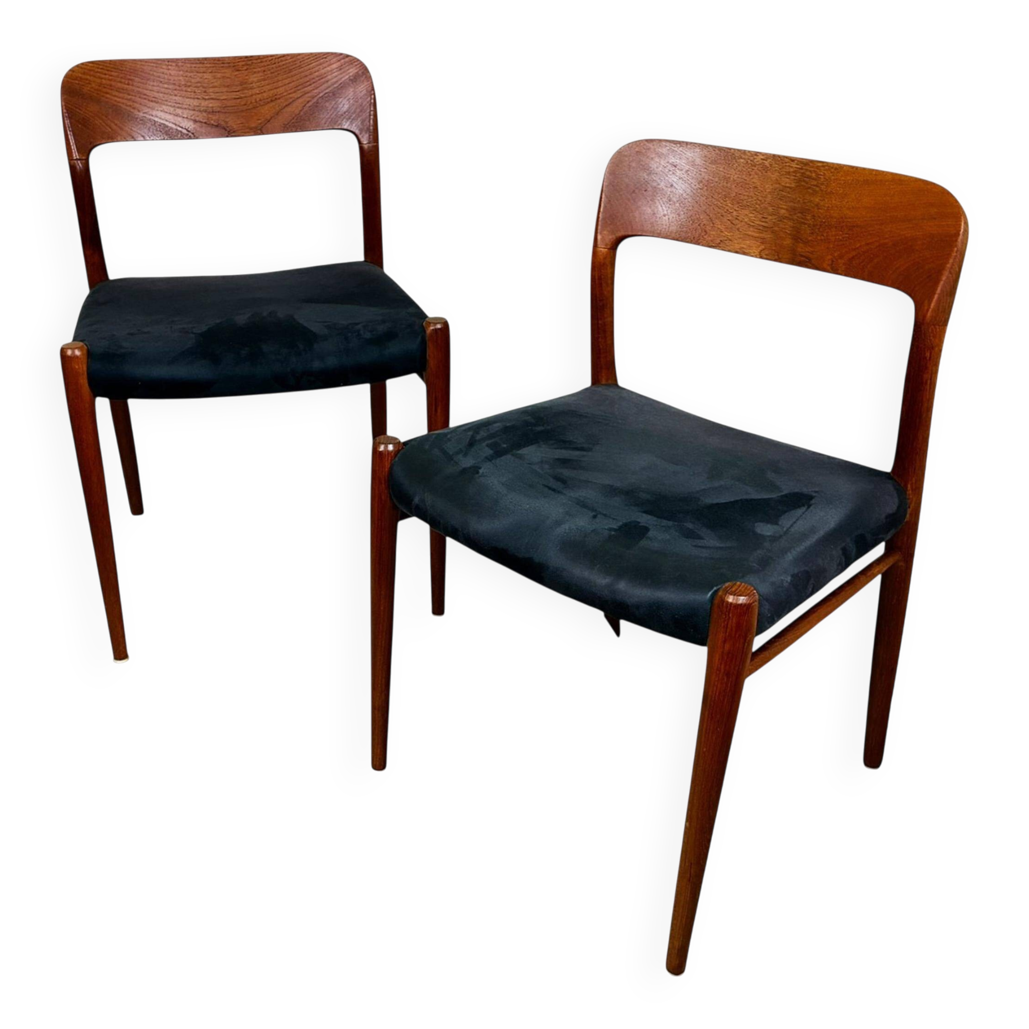 A beautiful pair of modern Scandinavian dining chairs in teak, model 75 by Niels Otto Møller.