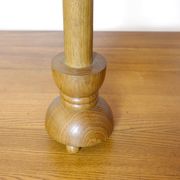 Wooden candle holder mounted as a lamp and its rope shade, 47.5cm.