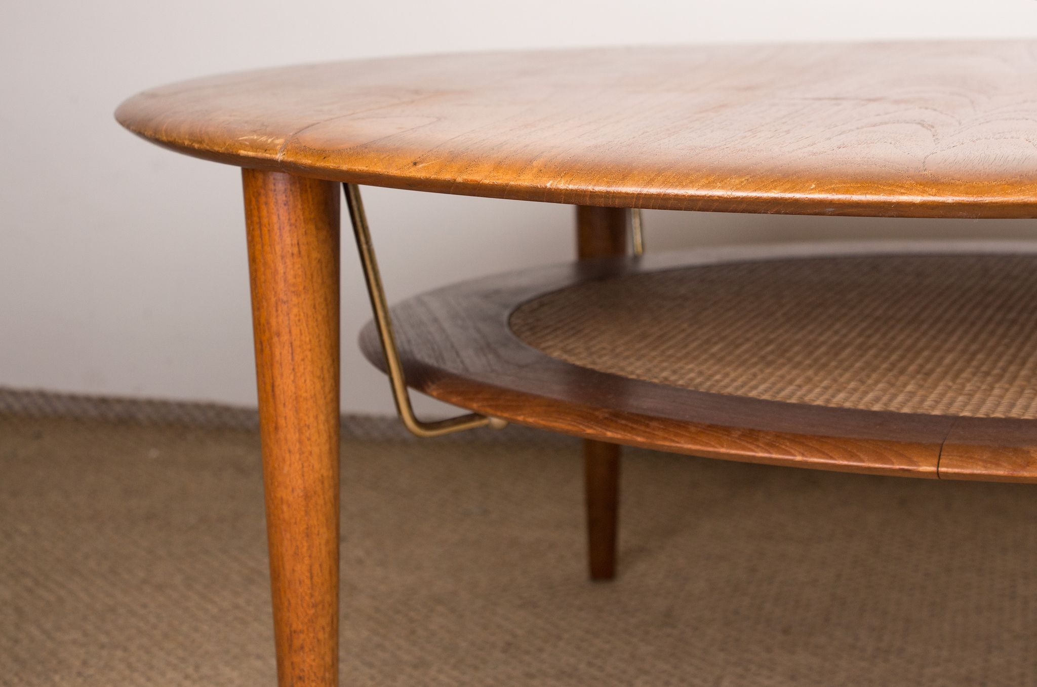 Round coffee table, two levels, danish in teak, brass and cannage