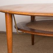 Round coffee table, two levels, danish in teak, brass and cannage