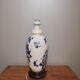 Ceramic lamp with Asian decoration with matching lampshade.