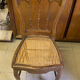 Antique wooden chair, cane seat