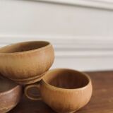Three cups made of ancient sandstone