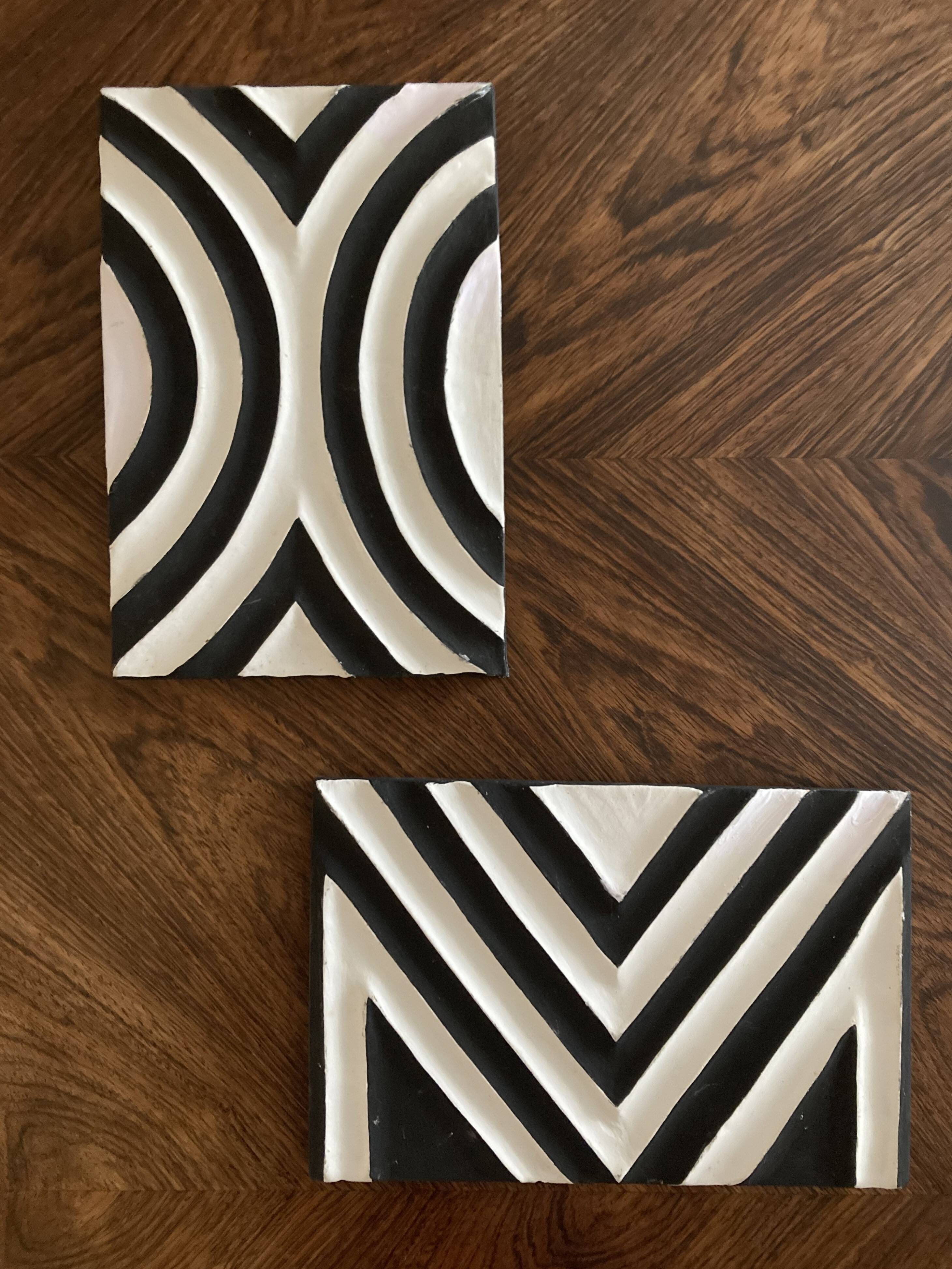 Two Imigongo paintings / panels traditional art from Rwanda