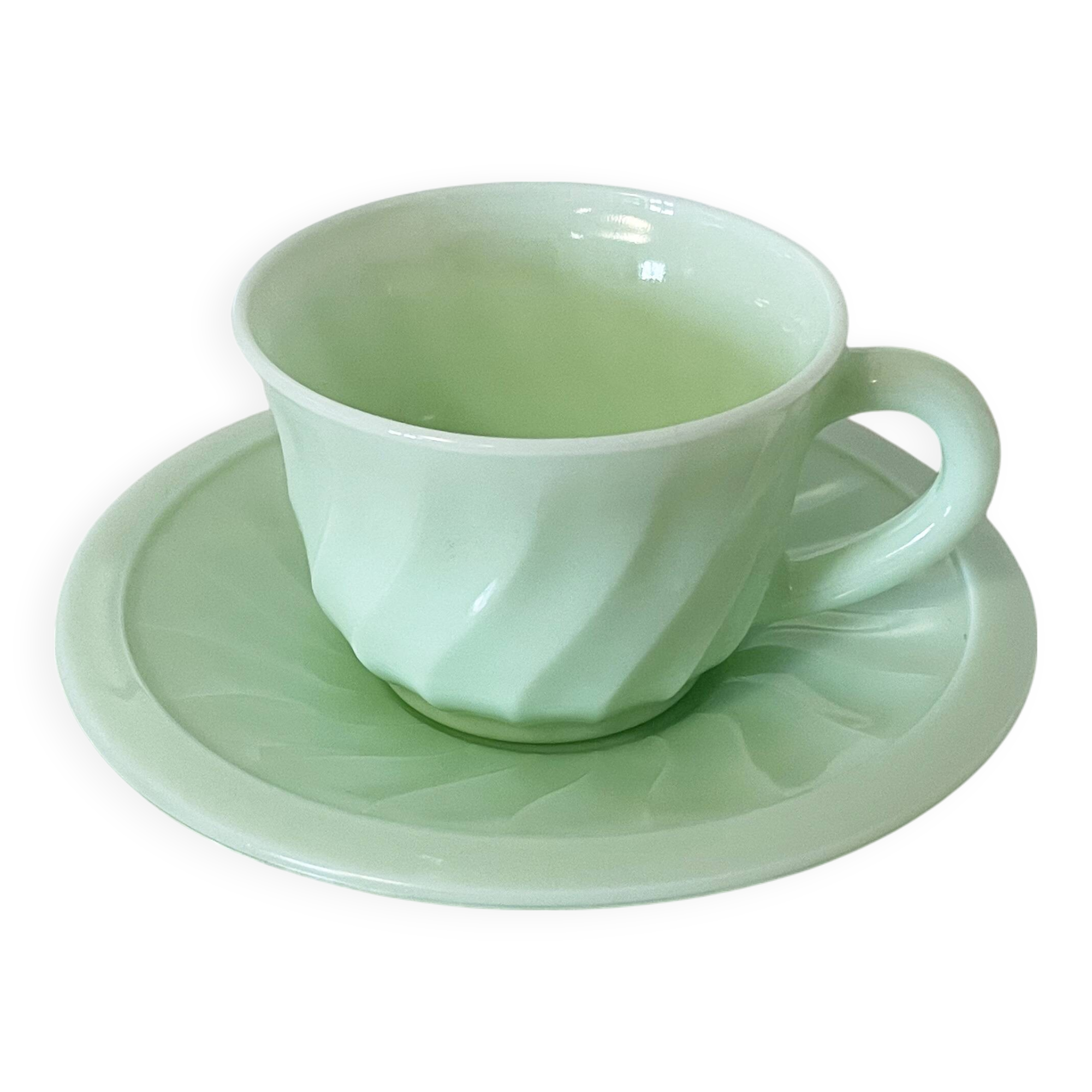 Tasse à thé et soucoupe en opaline vert menthe à motif tourbillon, fabriquées en France