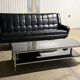 Table basse design vintage chrome et verre fumé noir sur roulettes