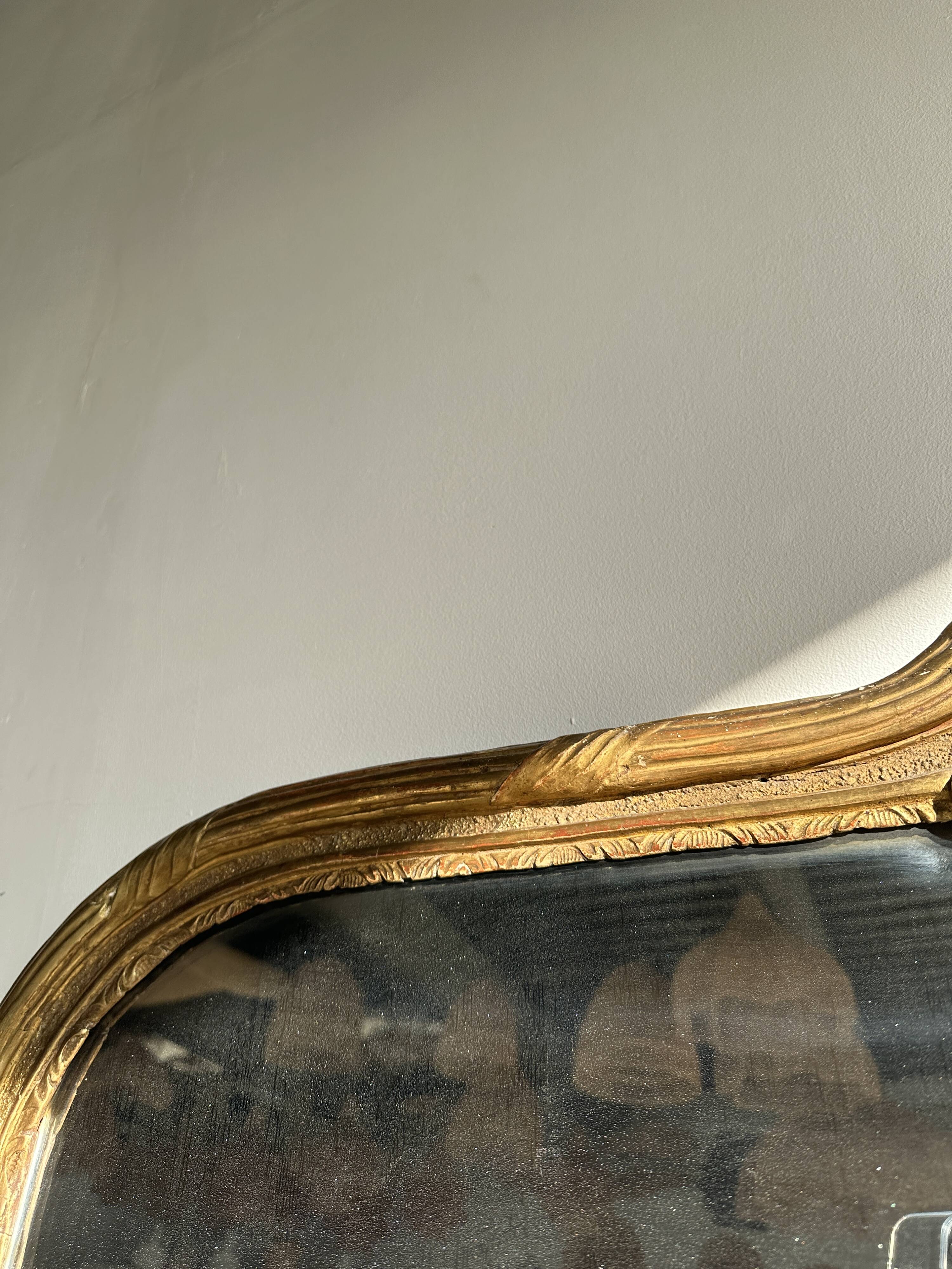 Large gilded mirror 19th century rounded corners mercury glass Louis XVI style