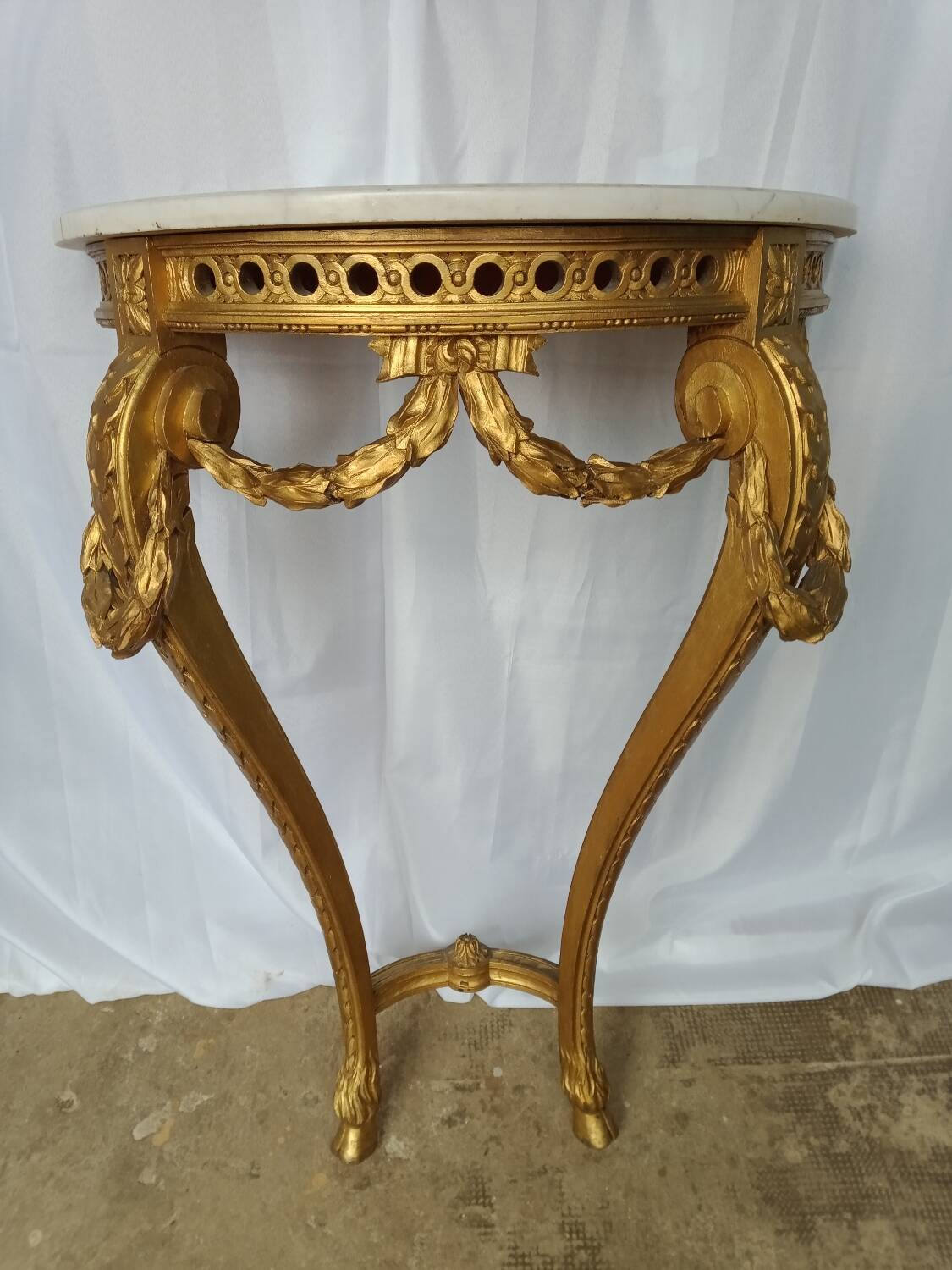 Louis XVI style console in gilded wood