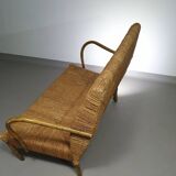 Vintage French papercord sofa with a metal frame base