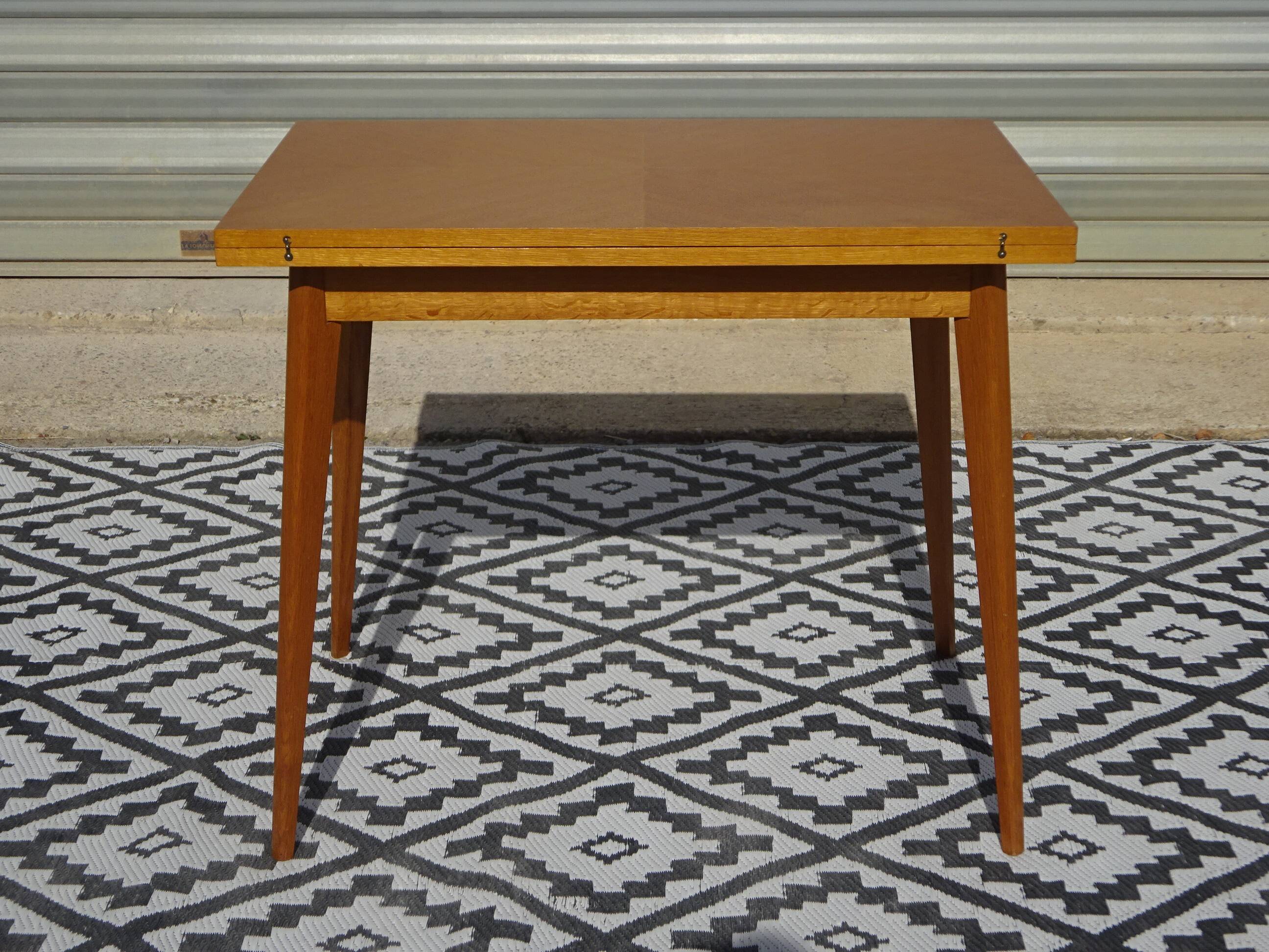 Scandinavian portfolio table model "half-century" by SAM