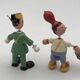 Set of 2 vintage GOULA wooden toy figurines with spring.