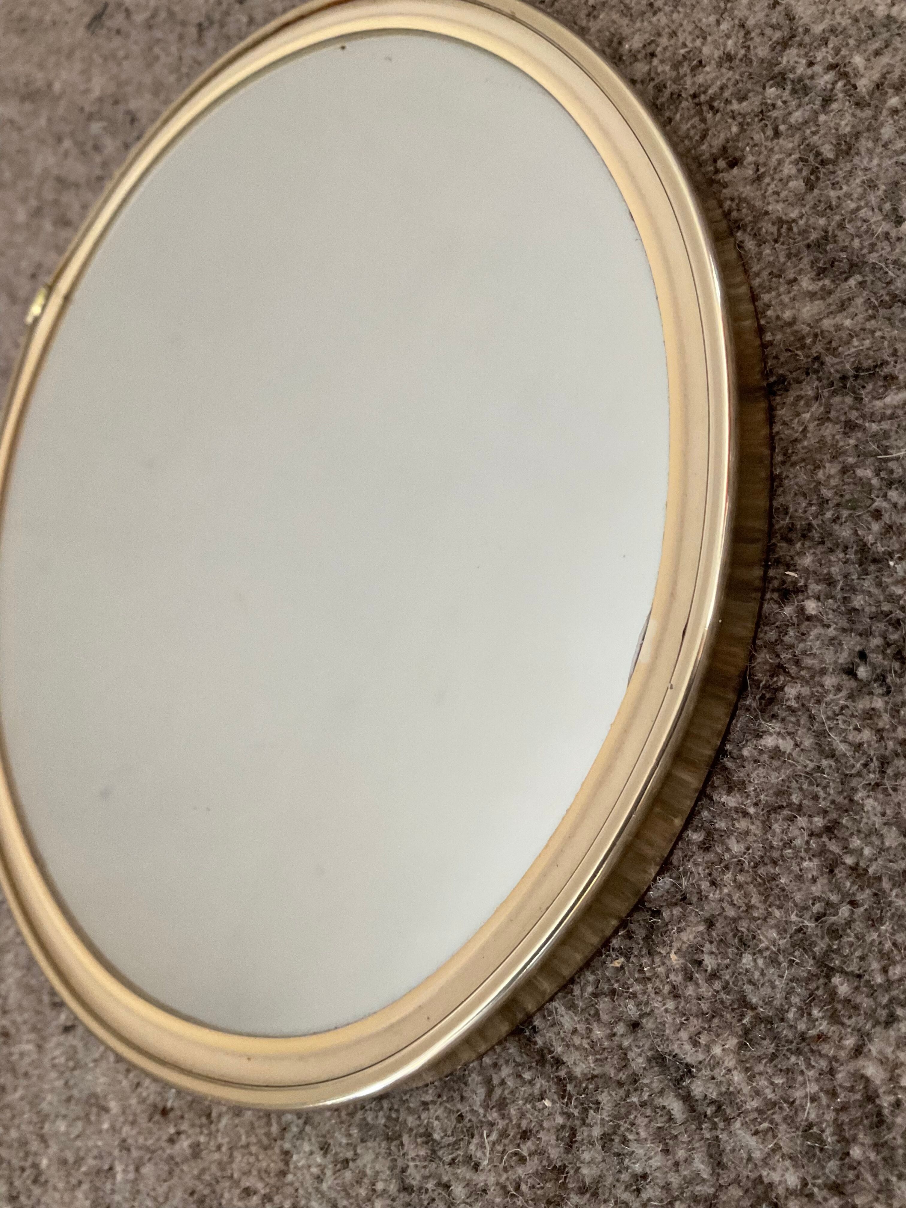 Vintage oval mirror from the 60s and 70s