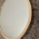 Vintage oval mirror from the 60s and 70s