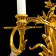 Pair of gilded bronze wall sconces in Rococo style, three lights.