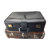Black soft suitcase with buckle on top