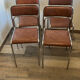 4 chrome chairs in faux leather