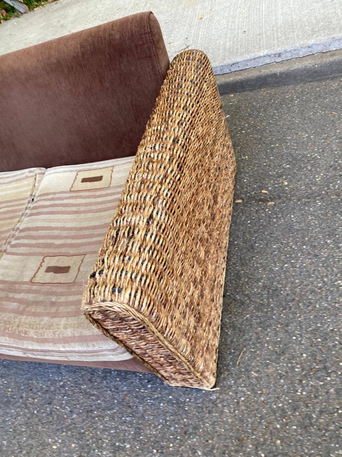 Exotic 2-seater sofa in woven banana tree / rattan and brown fabric.