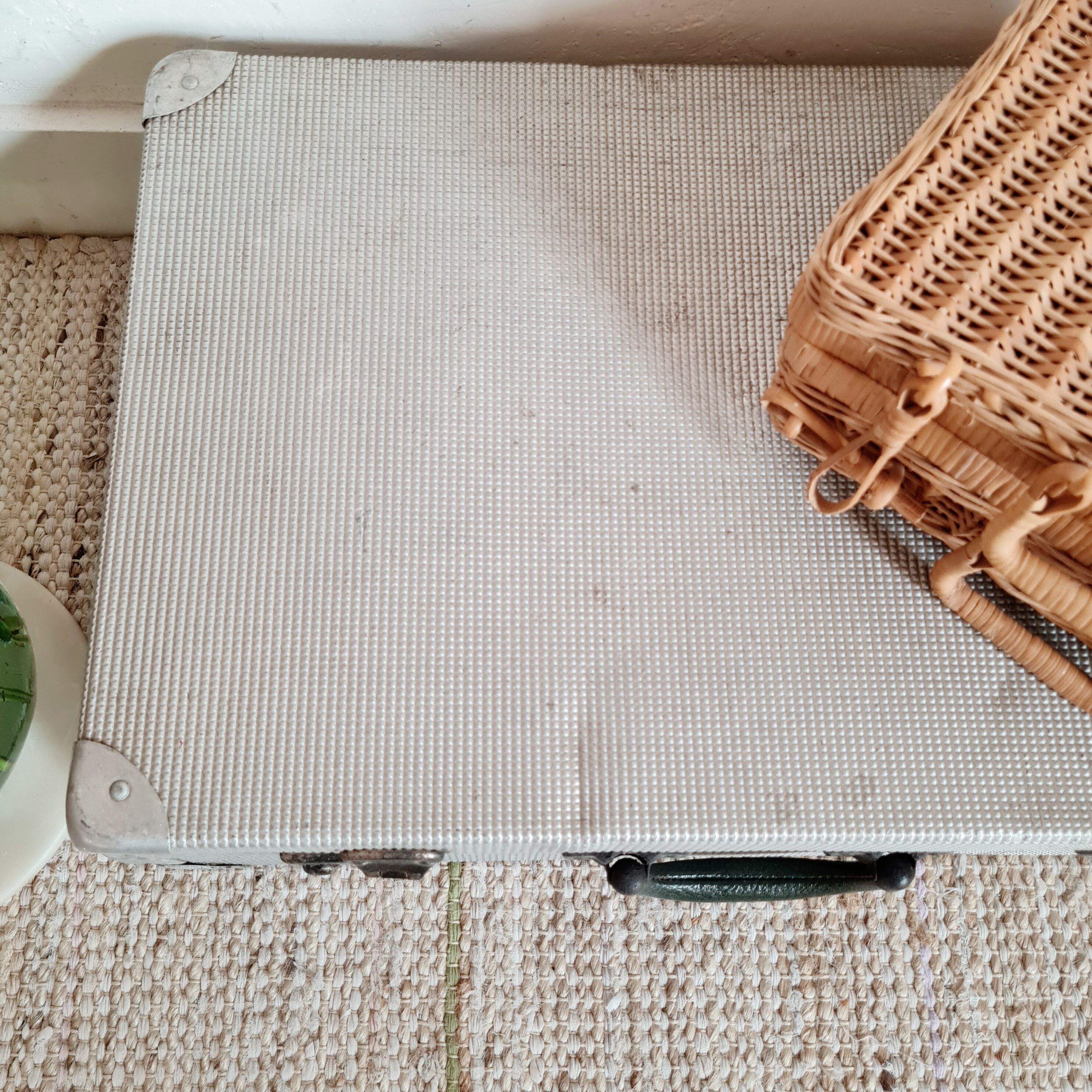 Old metal suitcase green leather handle