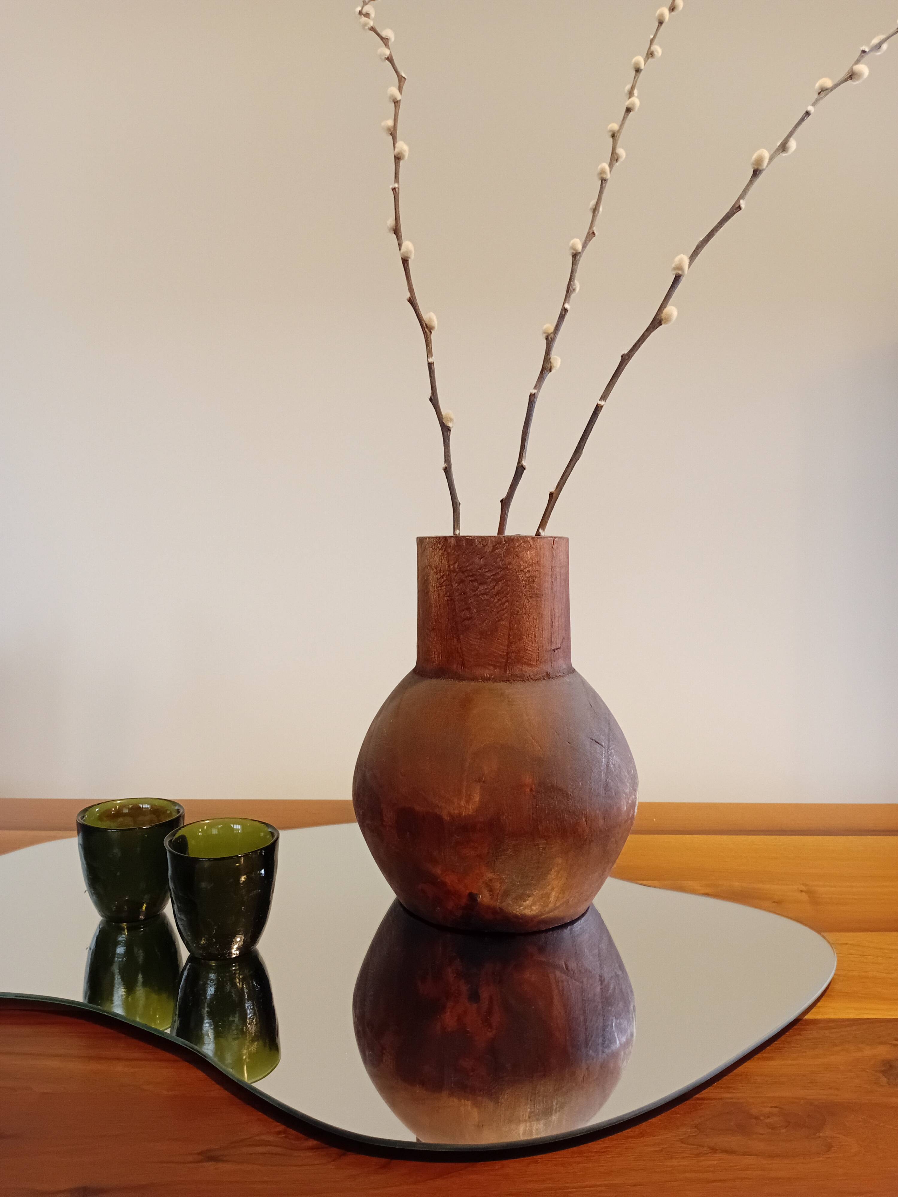 Carved wooden vase