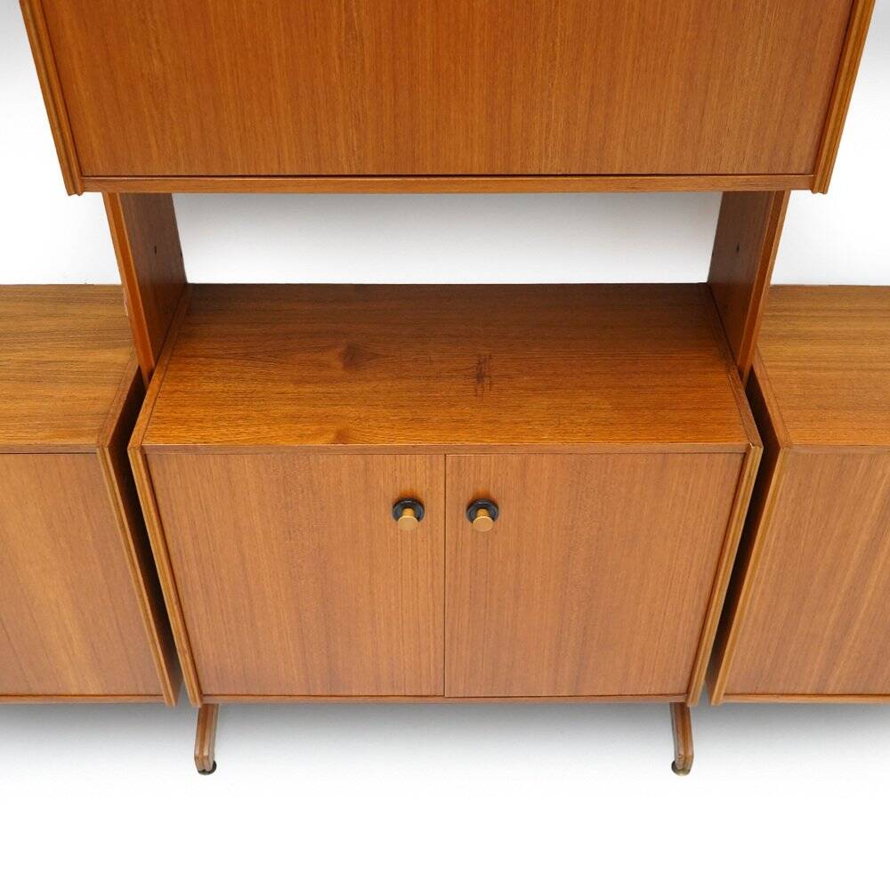 Library with wooden uprights by A.V. Contemporary Furnishings, 1960s.