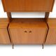 Library with wooden uprights by A.V. Contemporary Furnishings, 1960s.