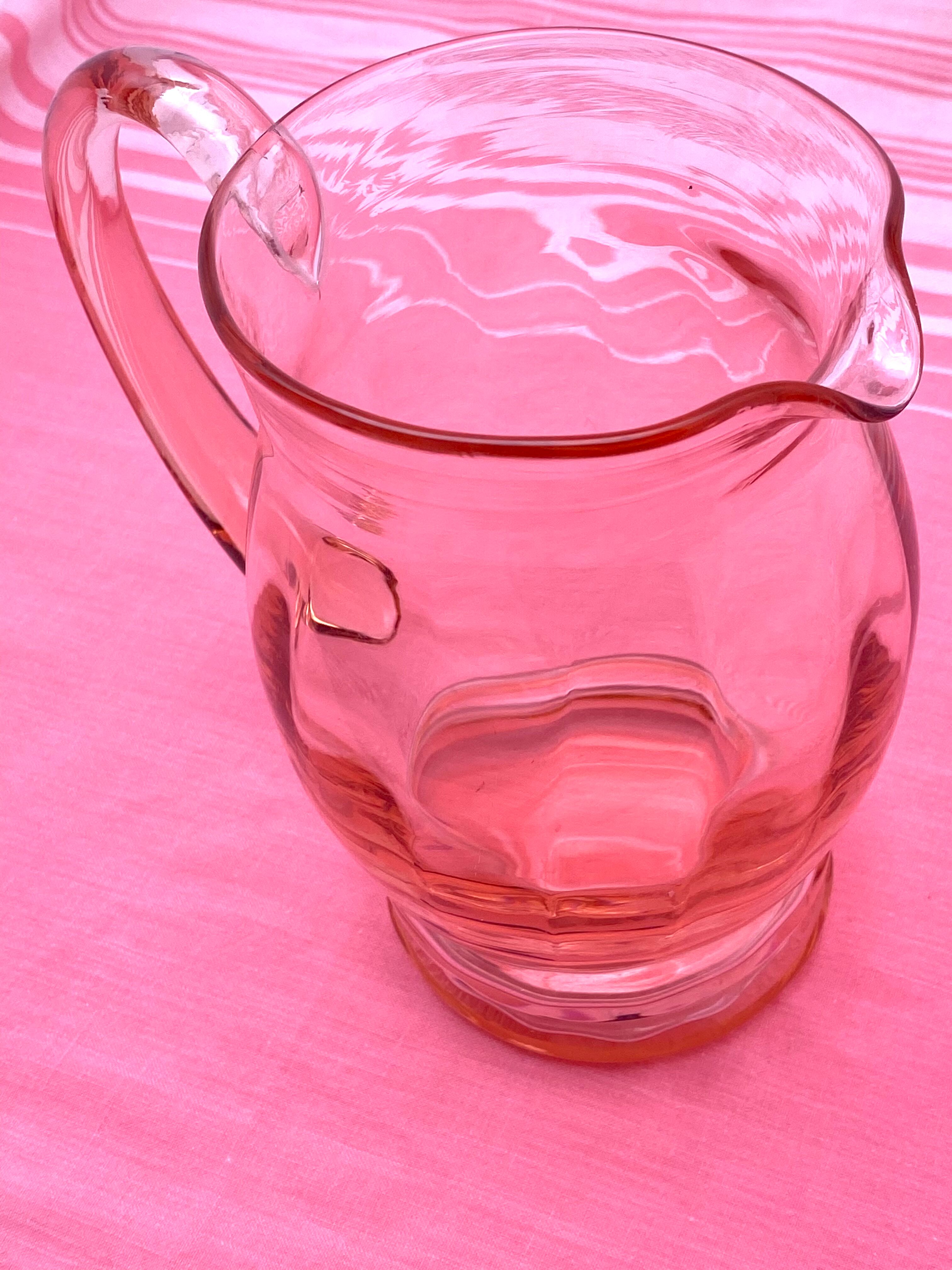 Rounded pink glass decanter