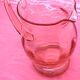 Rounded pink glass decanter