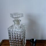 Glass whiskey carafe with spike pattern