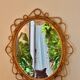 French circular sun-shaped mirror in rattan with knots, 1950s.