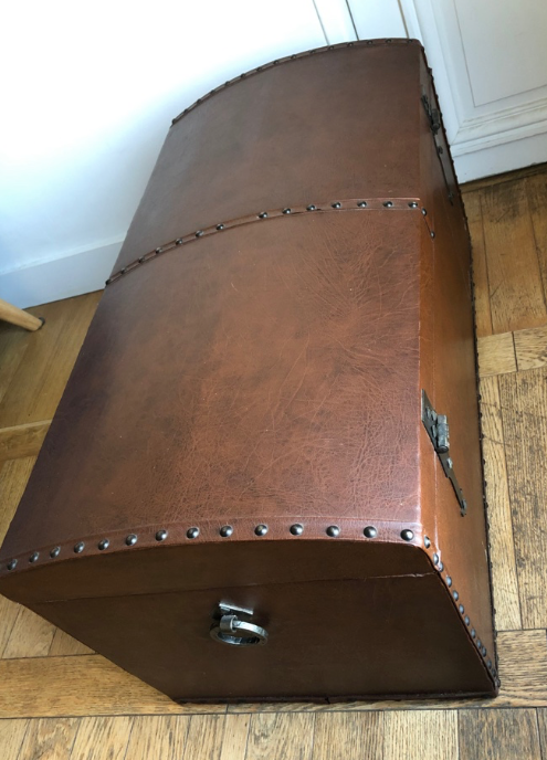 Ancient wooden and faux leather trunk