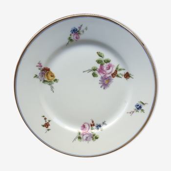 Assiette ancienne en porcelaine à décor floral vers 1920