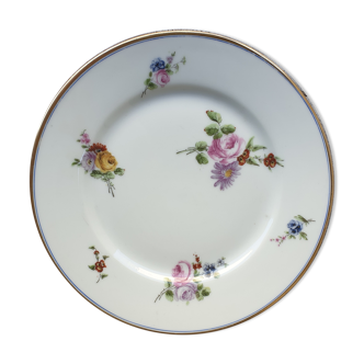 Assiette ancienne en porcelaine à décor floral vers 1920