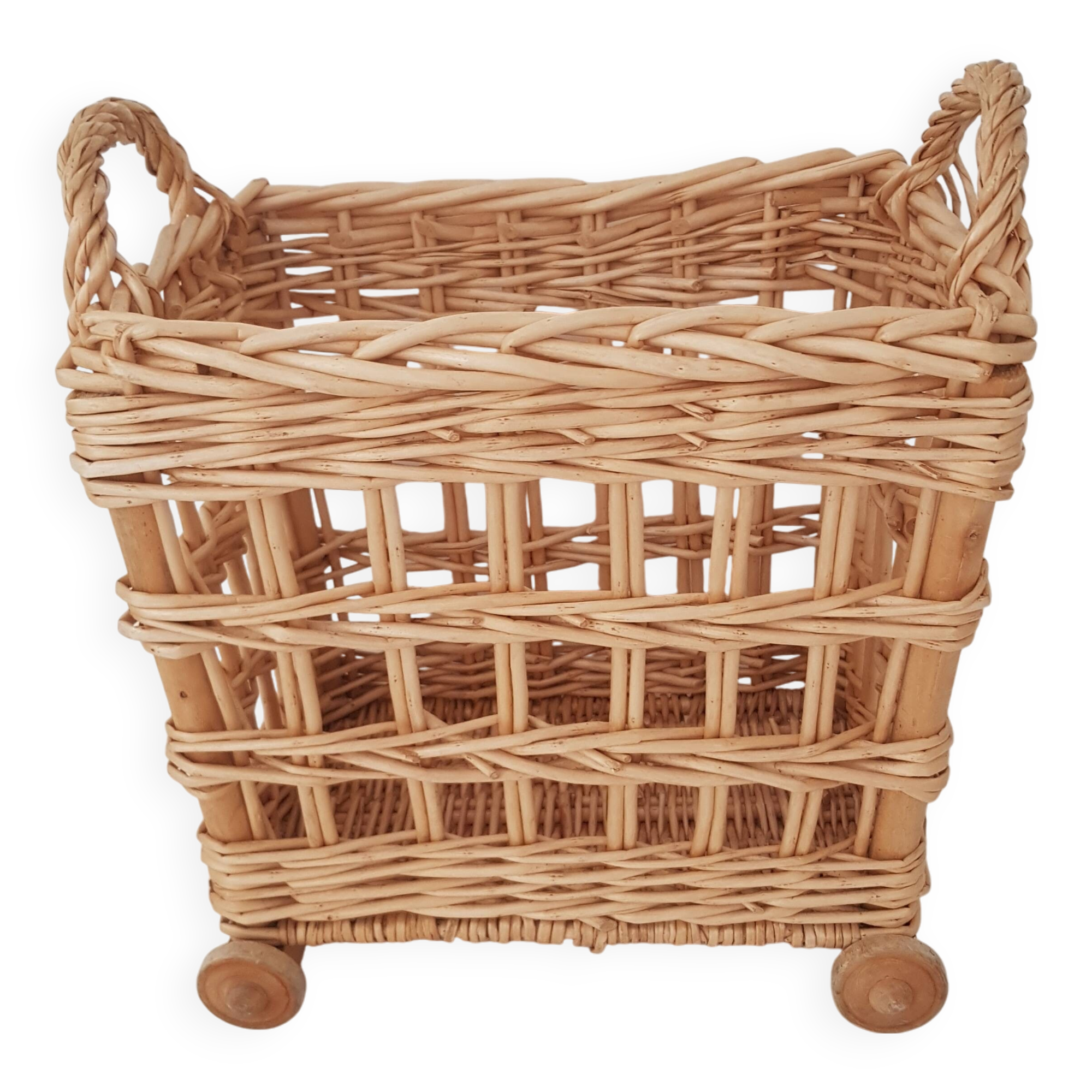 Vintage wicker basket on wheels - children's toy trolley