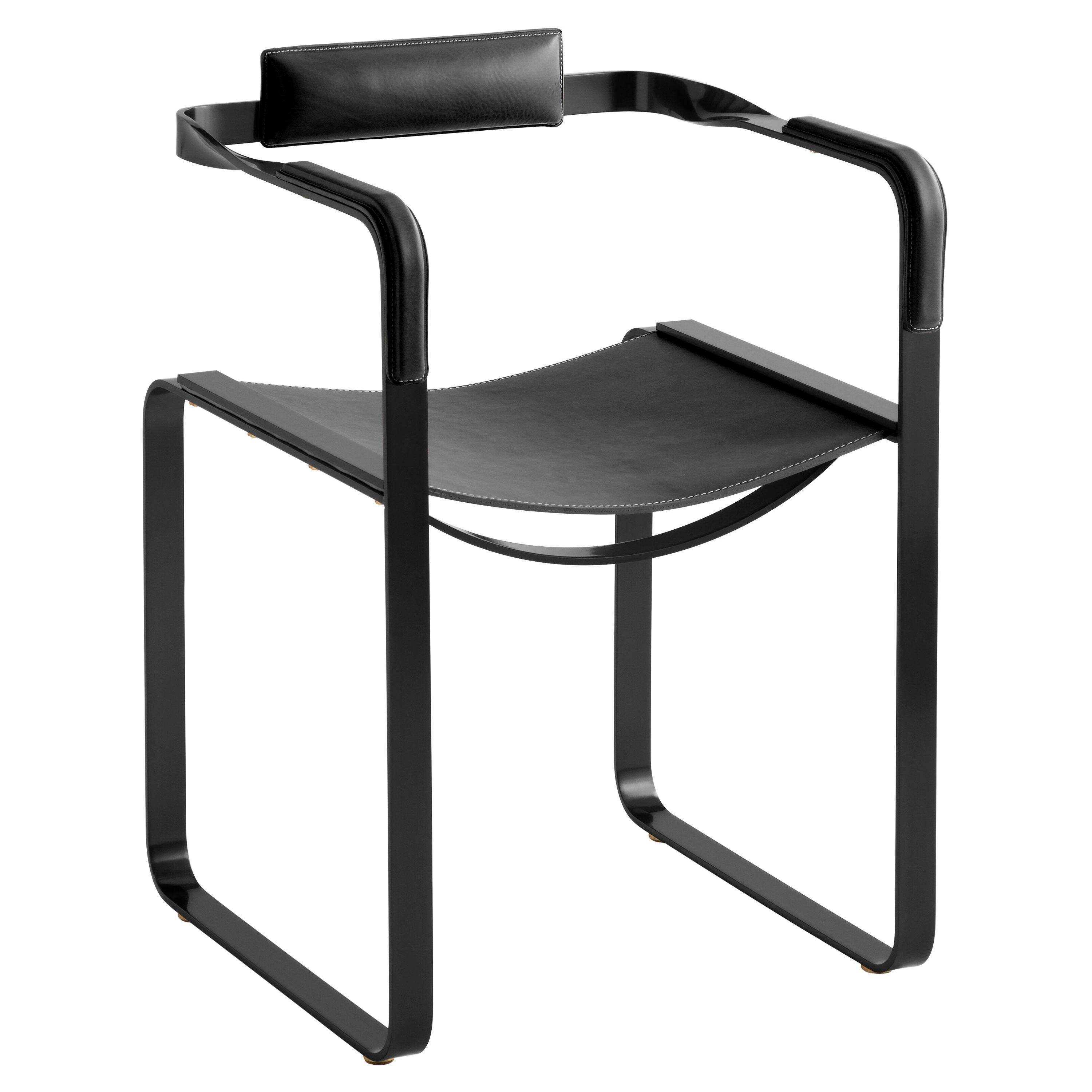 Armchair, smoked black steel and black leather, contemporary style.