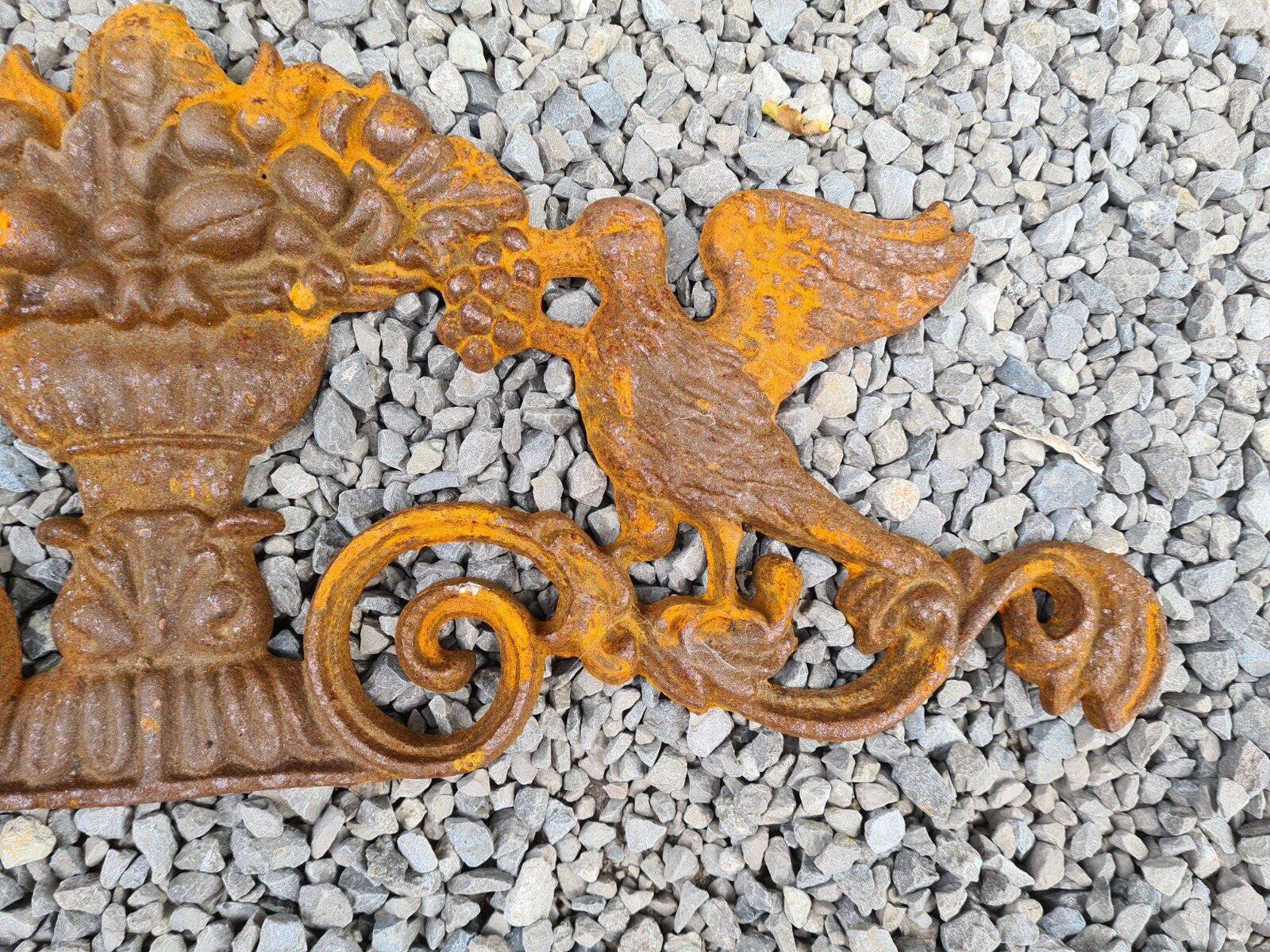 Cast iron pediment with birds