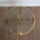 Round brass coffee table in neoclassical style
