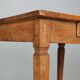Antique neoclassical walnut coffee table with maple inlays, 18th century.