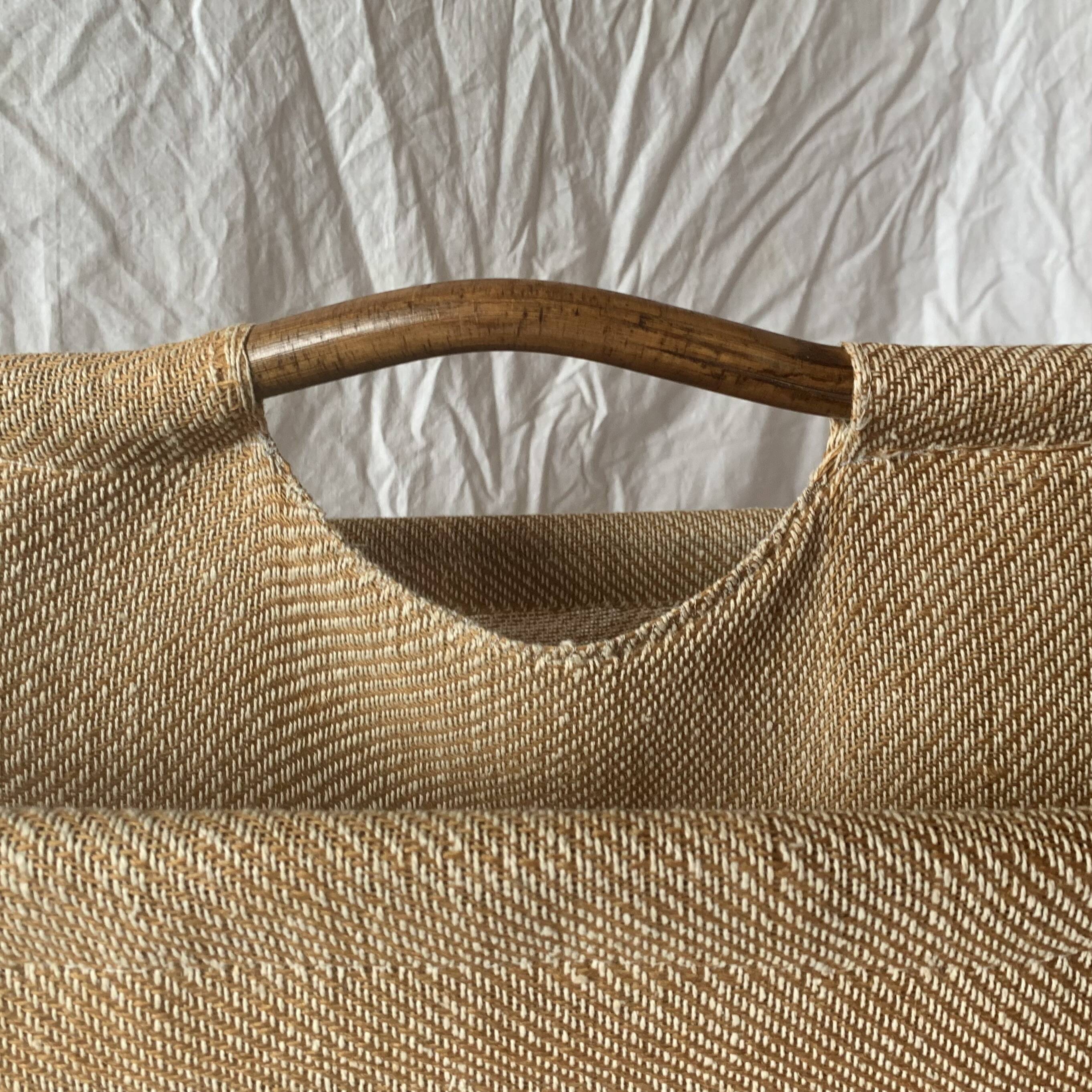 Vintage bamboo and fabric magazine rack