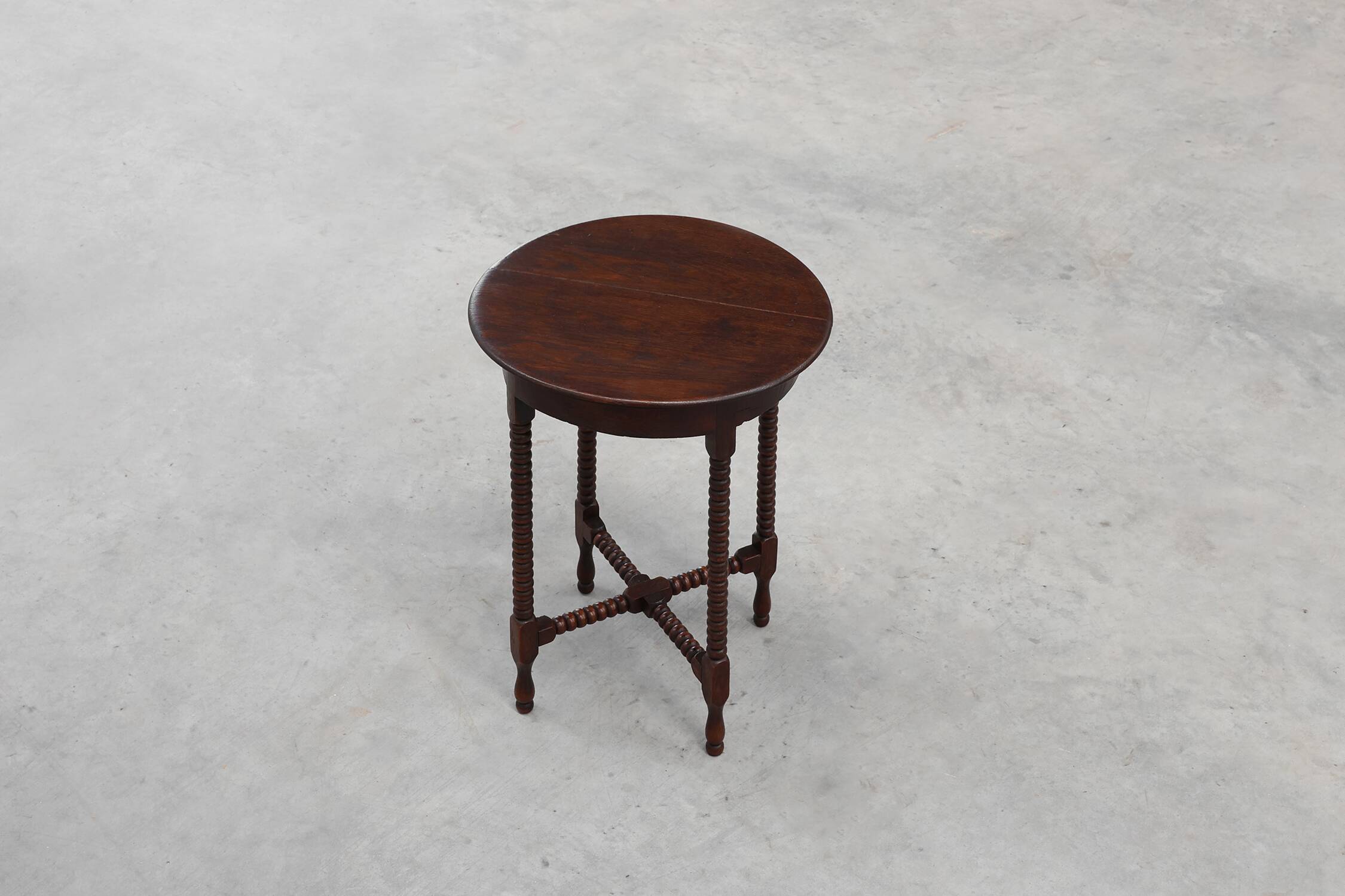 Art Deco round wooden side table with spindle legs, France circa 1900