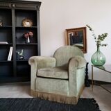Fringed velvet armchair