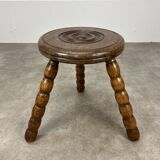 Brutalist tripod stool in the style of Dudouyt