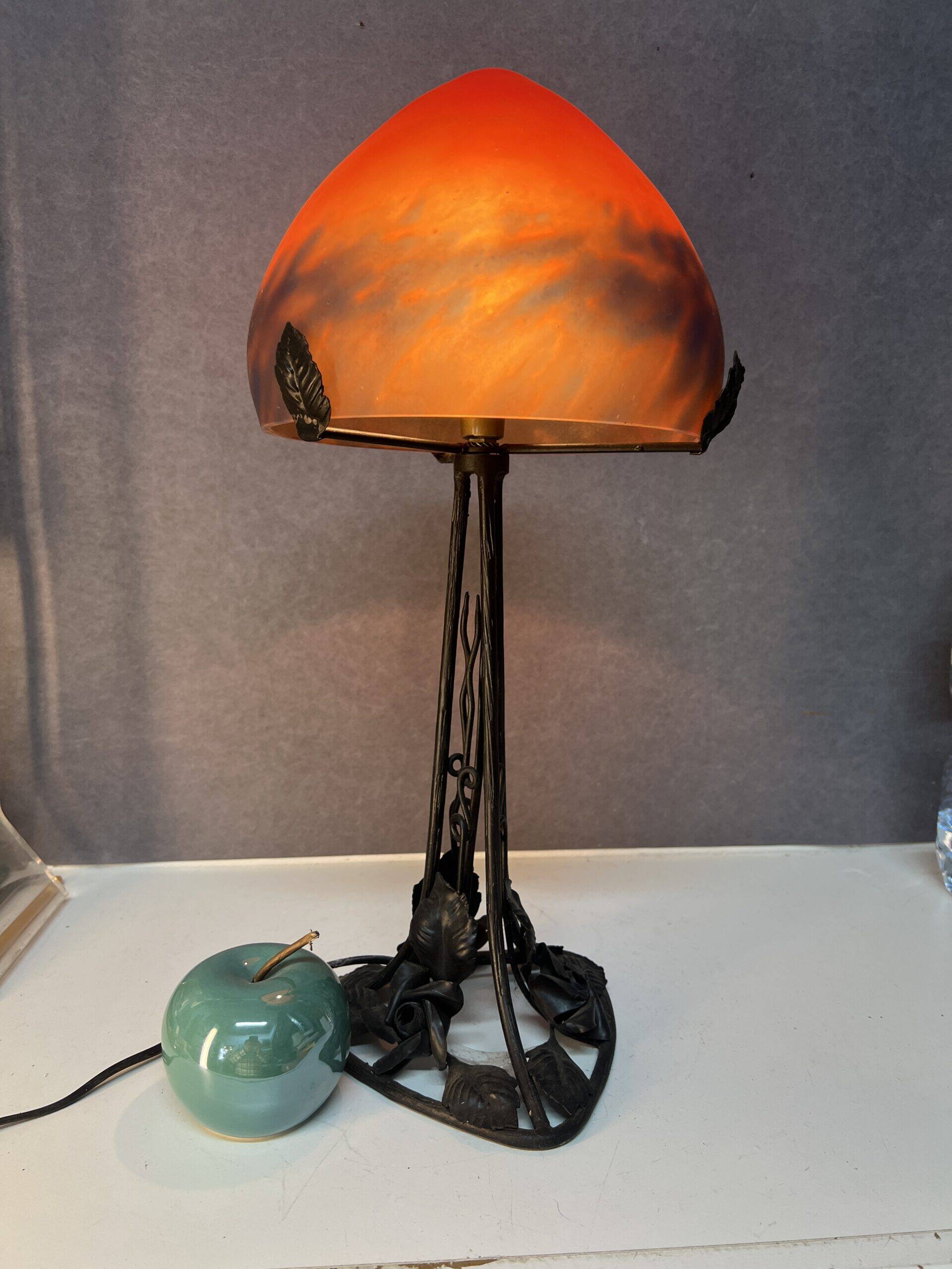 Contemporary mushroom lamp, wrought iron base and orange glass shell with blue hues in the art deco style