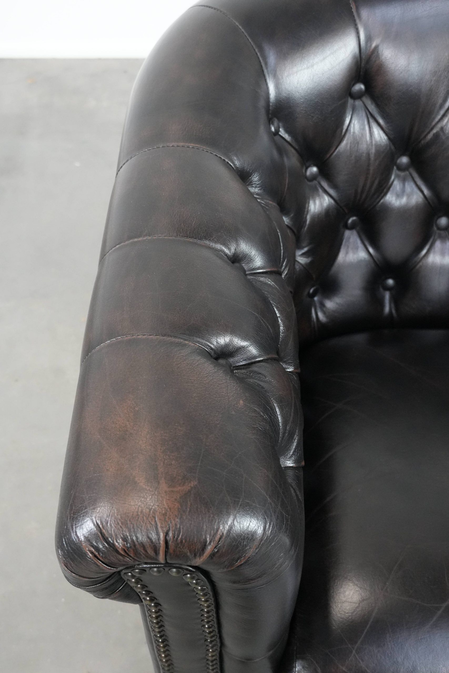Dark luxury cowhide Chesterfield club armchair in English style