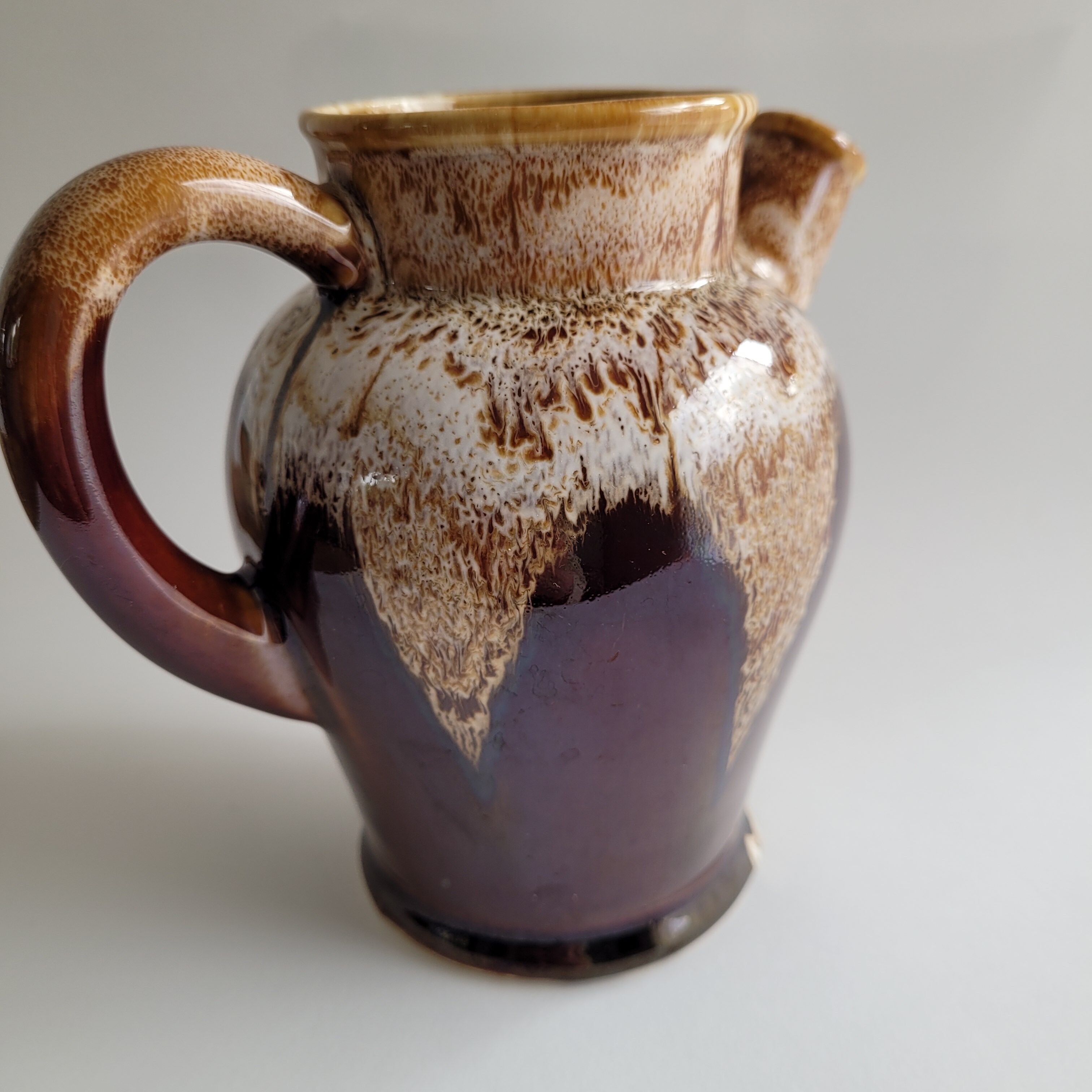 Flowing enamel pitcher