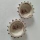 Duo of handmade beige and terracotta earthenware empty pockets